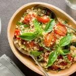 Fregola with tomatoes and basil
